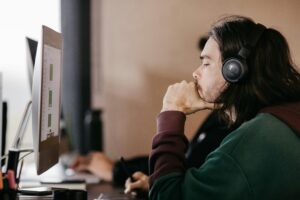 Man working with headphones on