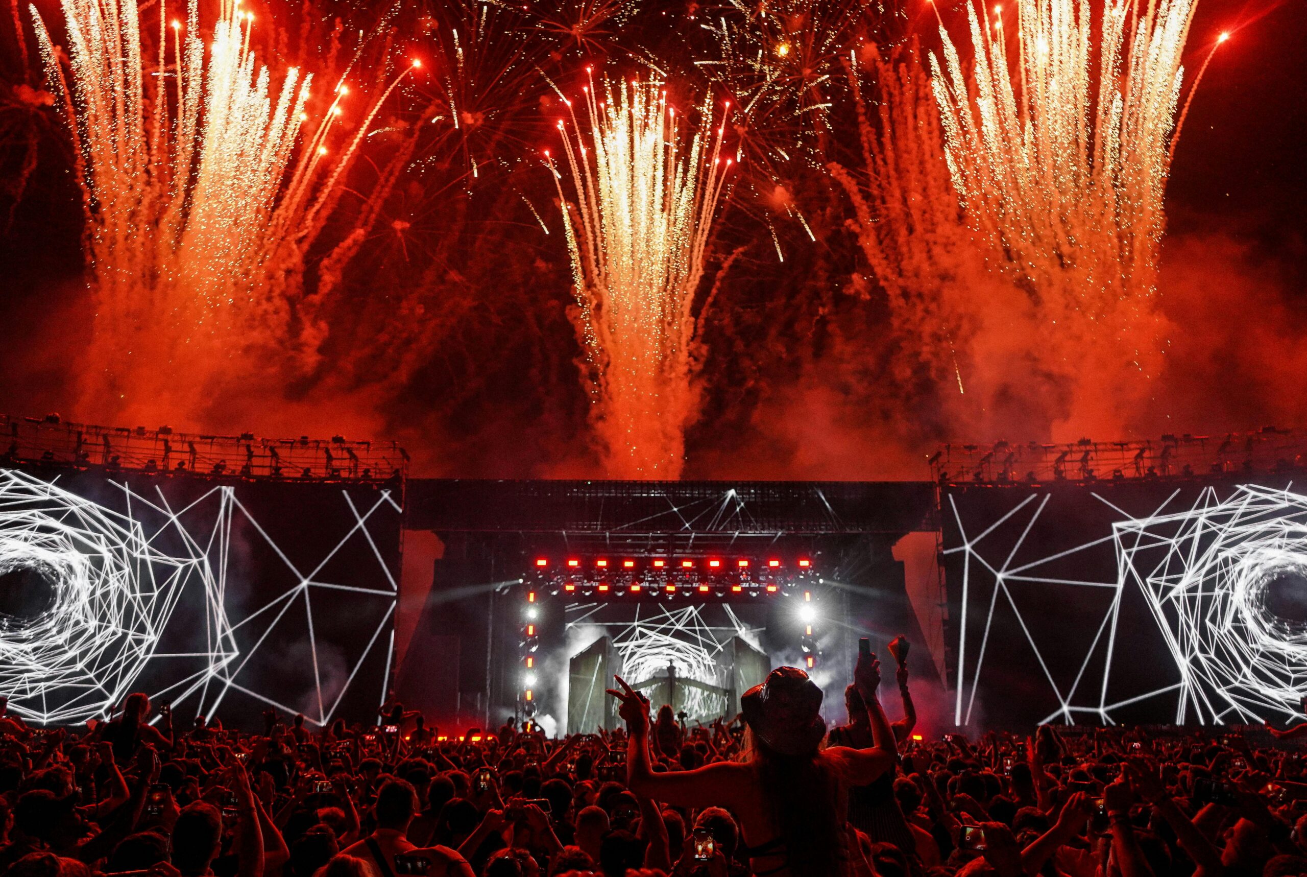 People outside watching a concert