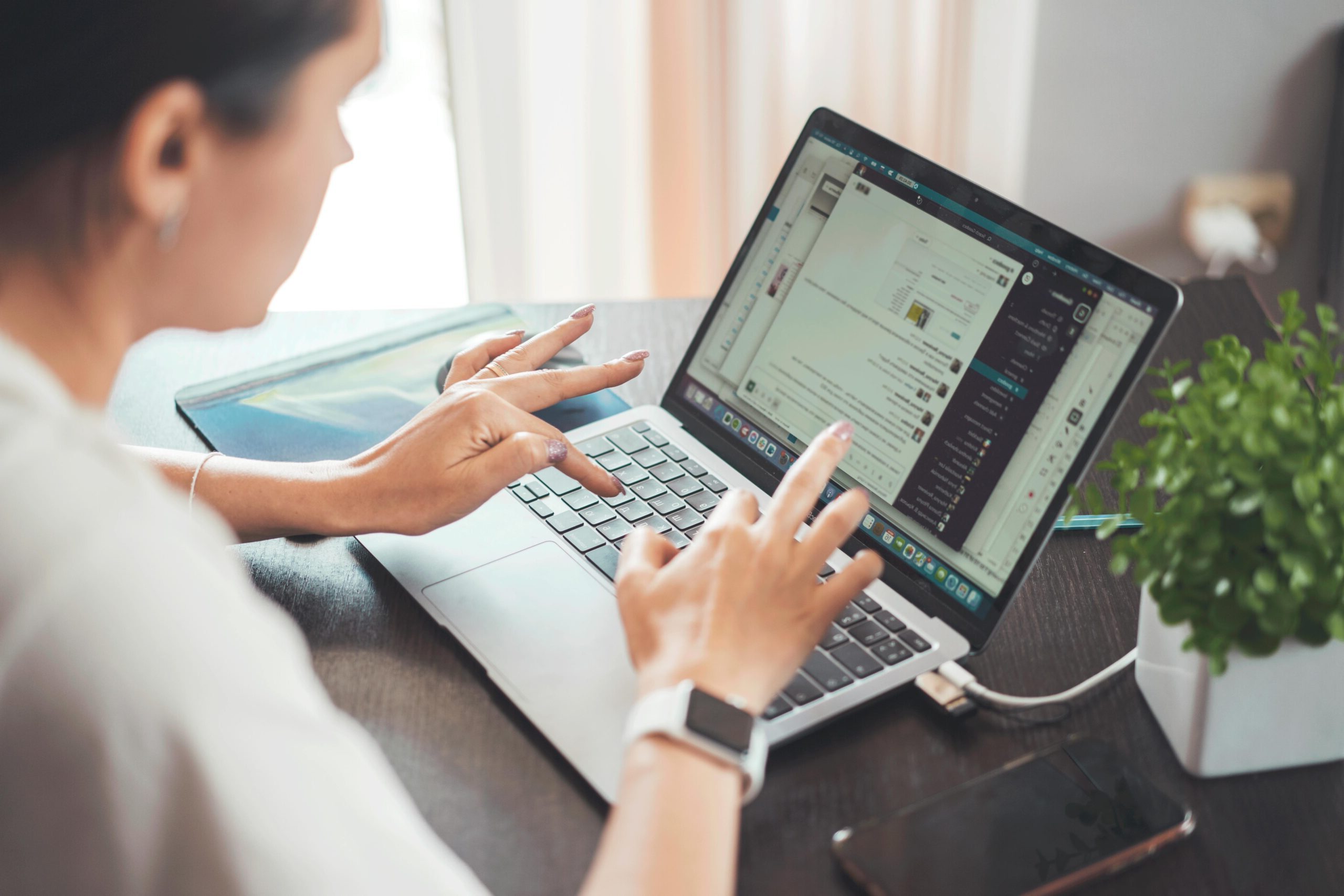 Woman moderating, supporting brand growth through social media moderation