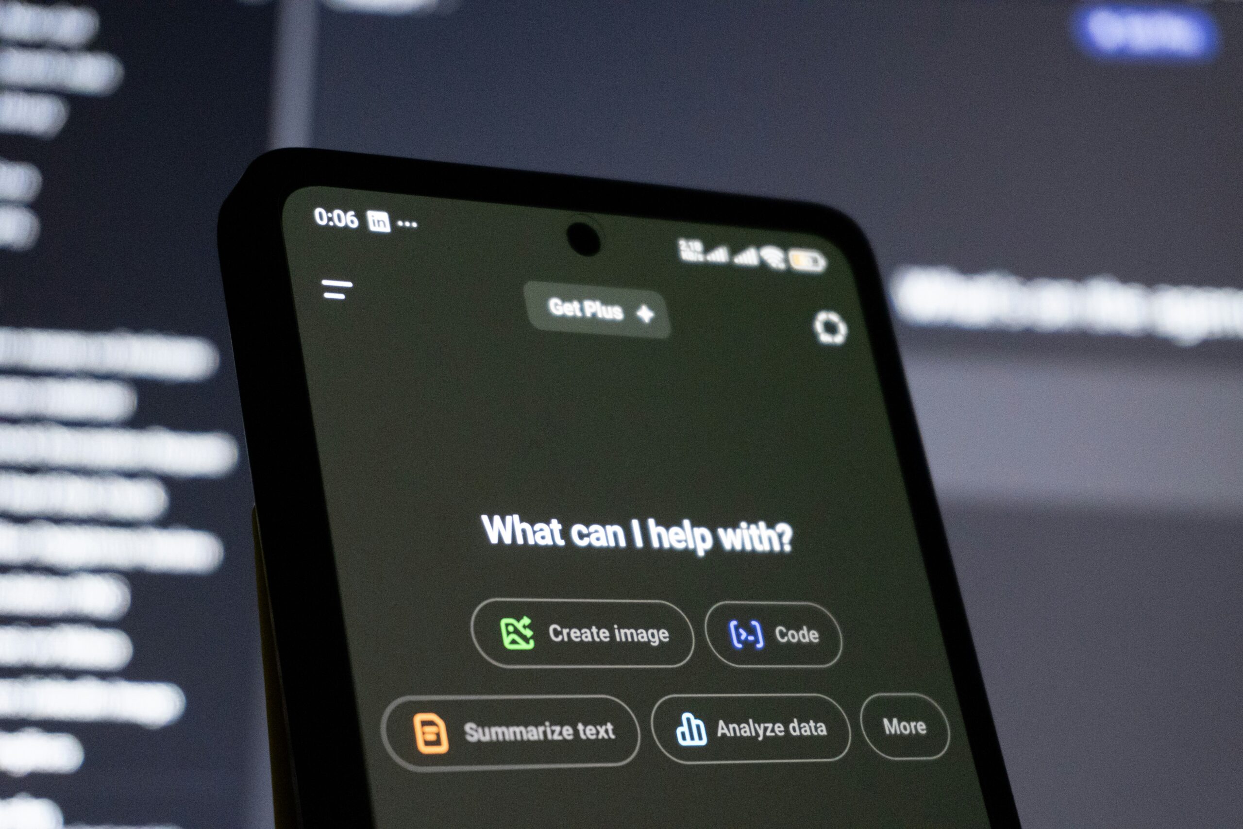 Image of AI on a phone asking how it can help