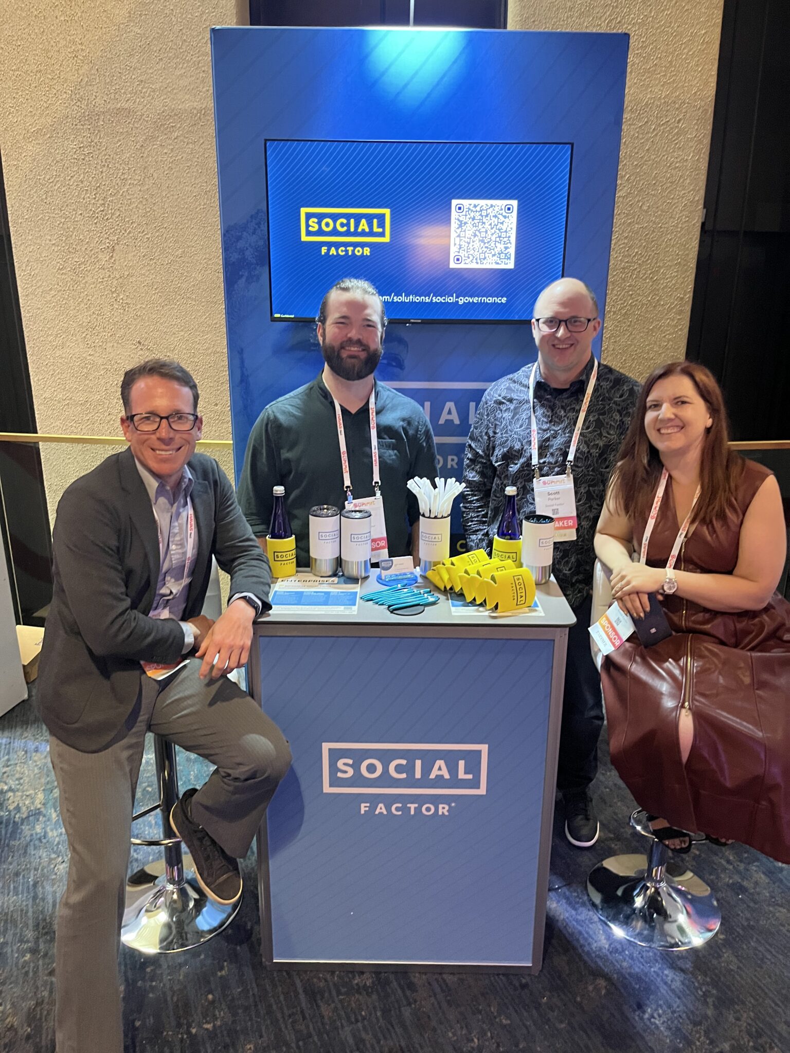 Social Factor Team at a conference