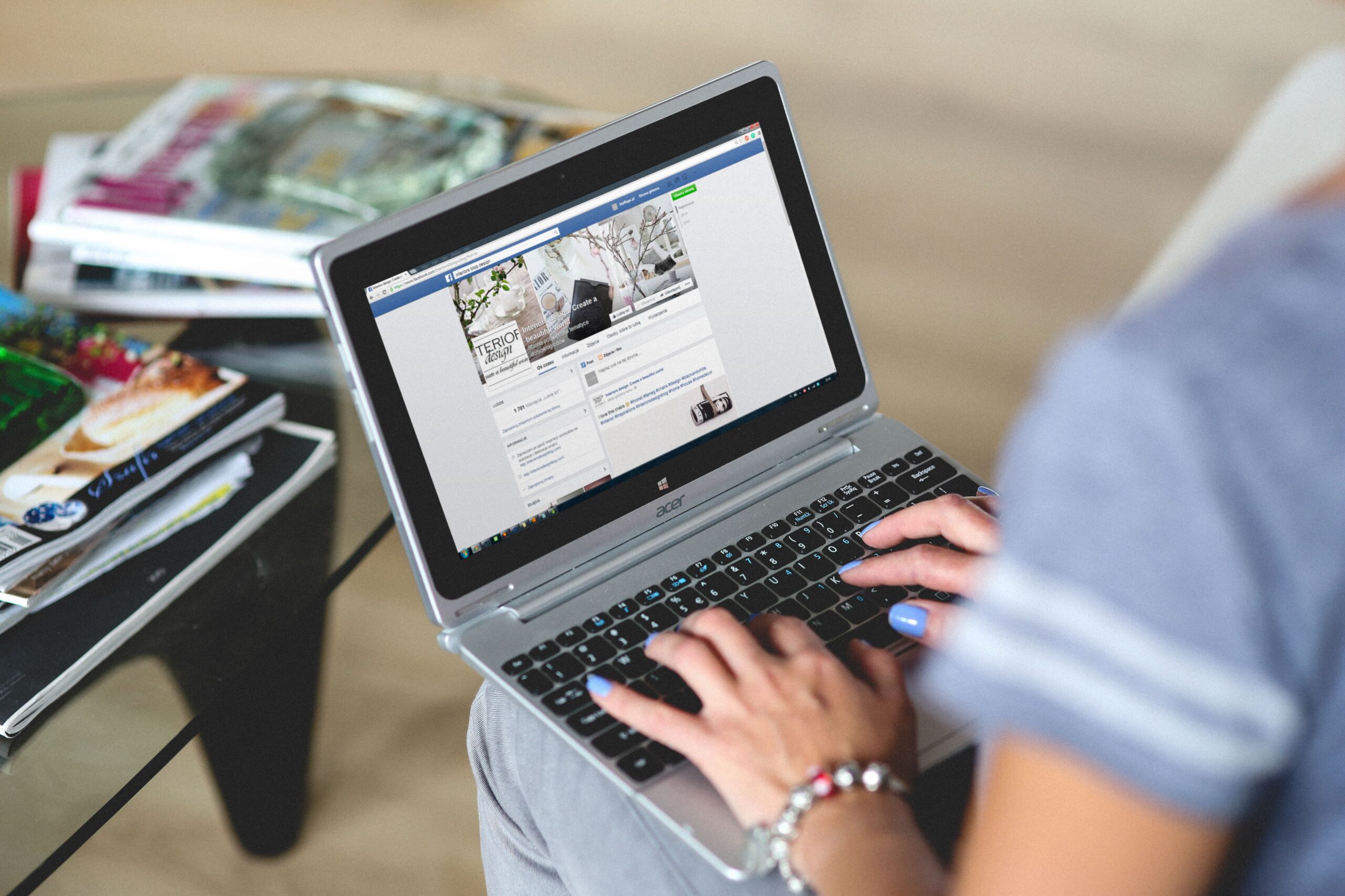 someone on a laptop doing social media